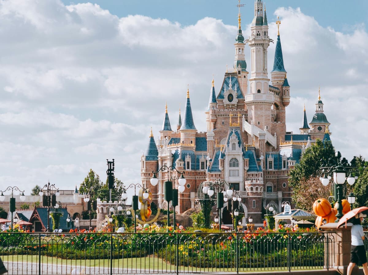 Shanghai Disneyland Castle with families enjoying the magic